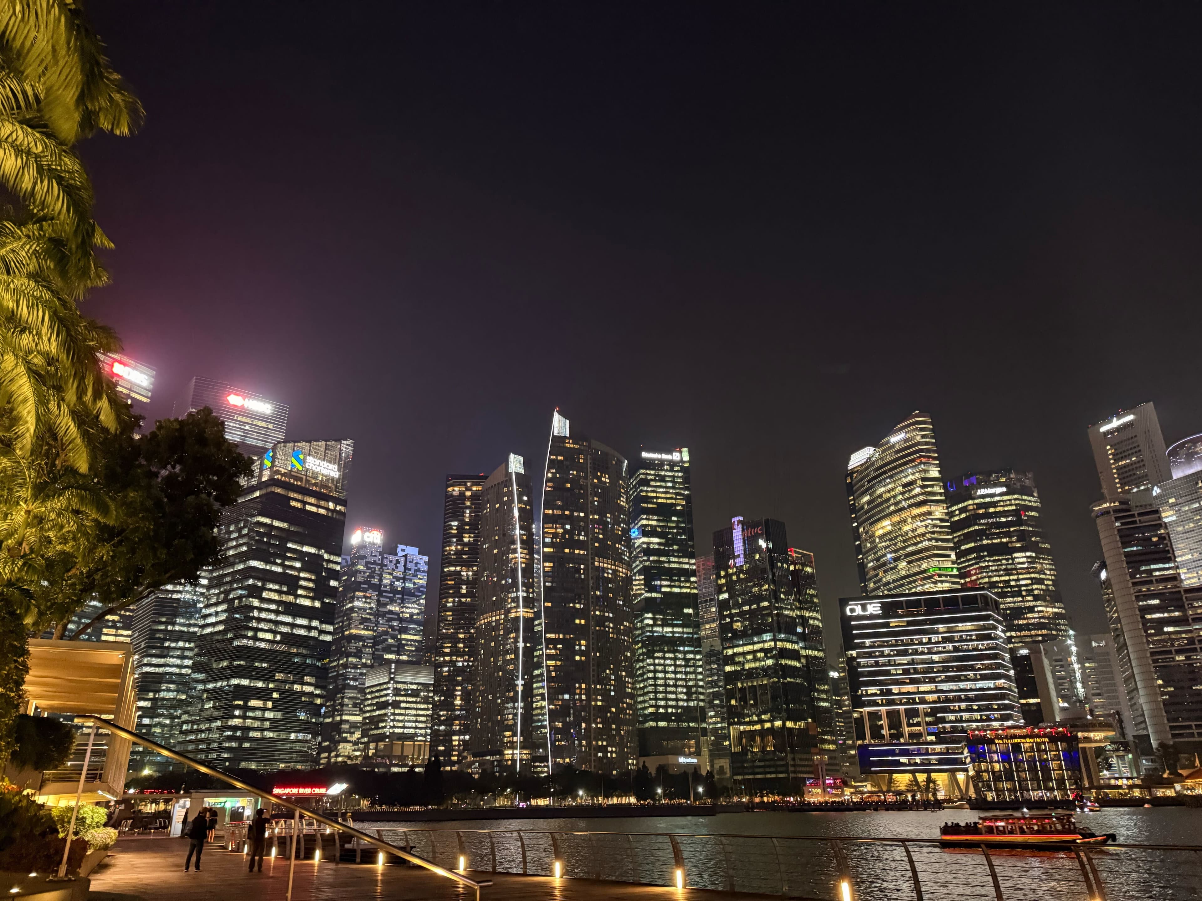 Singapore CBD skyline reflected in the water at night
