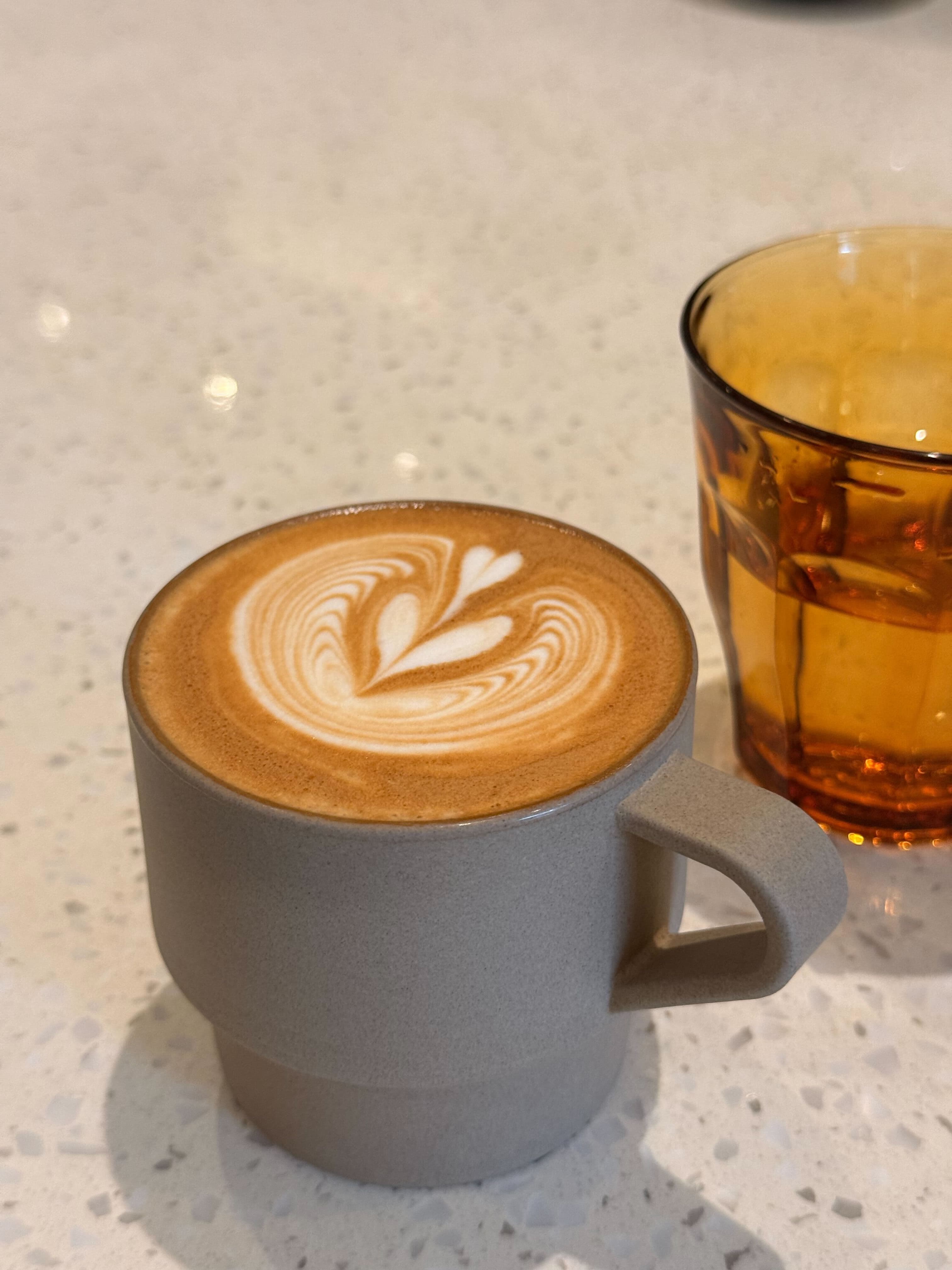 Latte in a grey ceramic mug